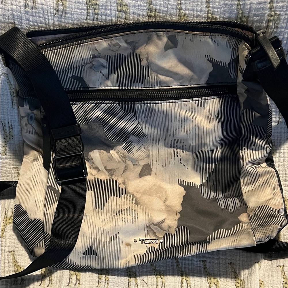 Tumi Black and Cream crossbody travel  Bag magnetic pocket zip top closure